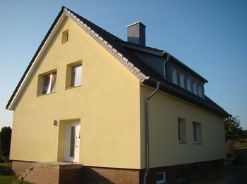 312035