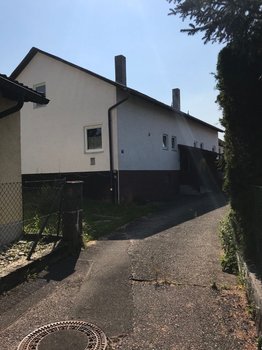 329054