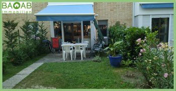 GEPFLEGTE FERIENWOHNUNG in BESTLAGE mit GARTEN IN BIBIONE