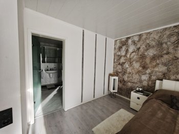 Schlafzimmer mit Bad en Suite WE1