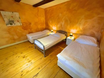Appartement 5 - Dreibett Schlafzimmer