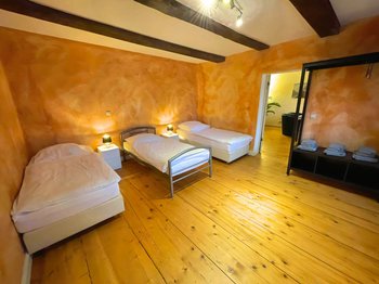 Appartement 5 - Dreibett Schlafzimmer