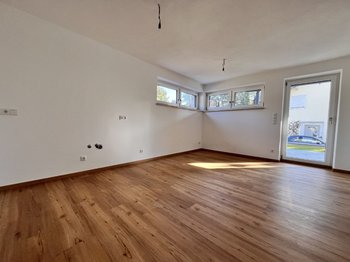 387114